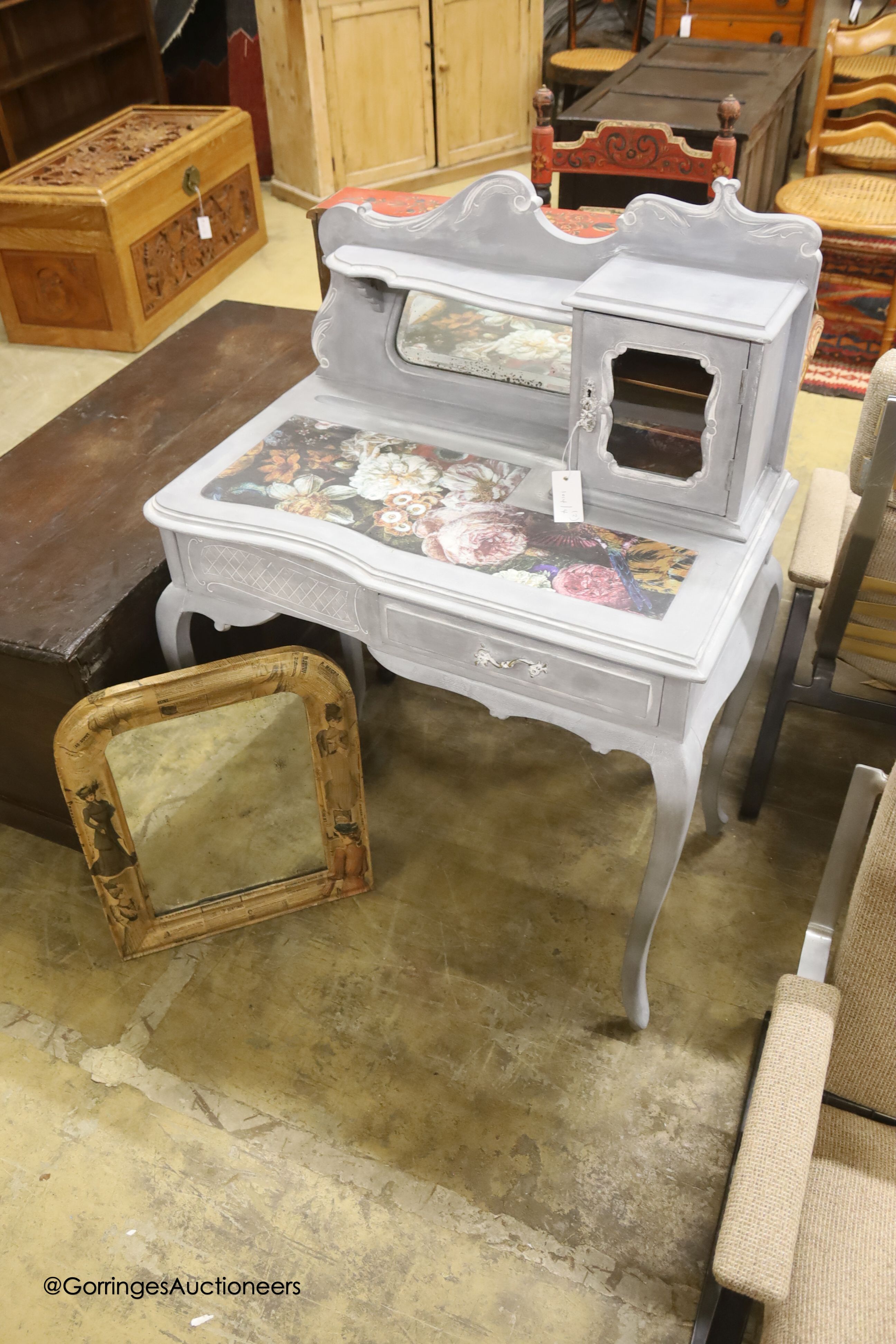 A Victorian later painted dressing table, width 75cm, depth 44cm, height 106cm together with a decoupage wall mirror